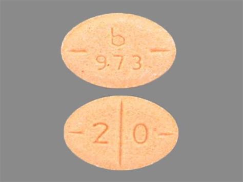 Color: Peach. . Orange oval pill b 973 30